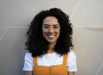 A happy student from the Diploma of Human Resource Management offered by the Australian Pacific College