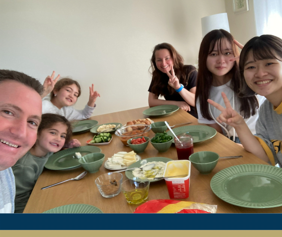 Students dining with host family as part of Homestay accommodation - Australian Pacific College